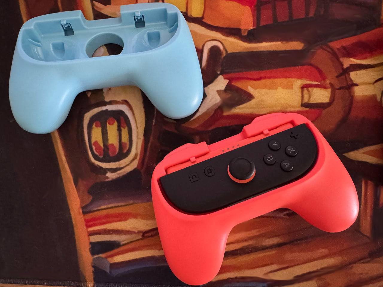 Oniverse Impugnature Joy-Con Switch 2 Grip Arancione Blu 2pz